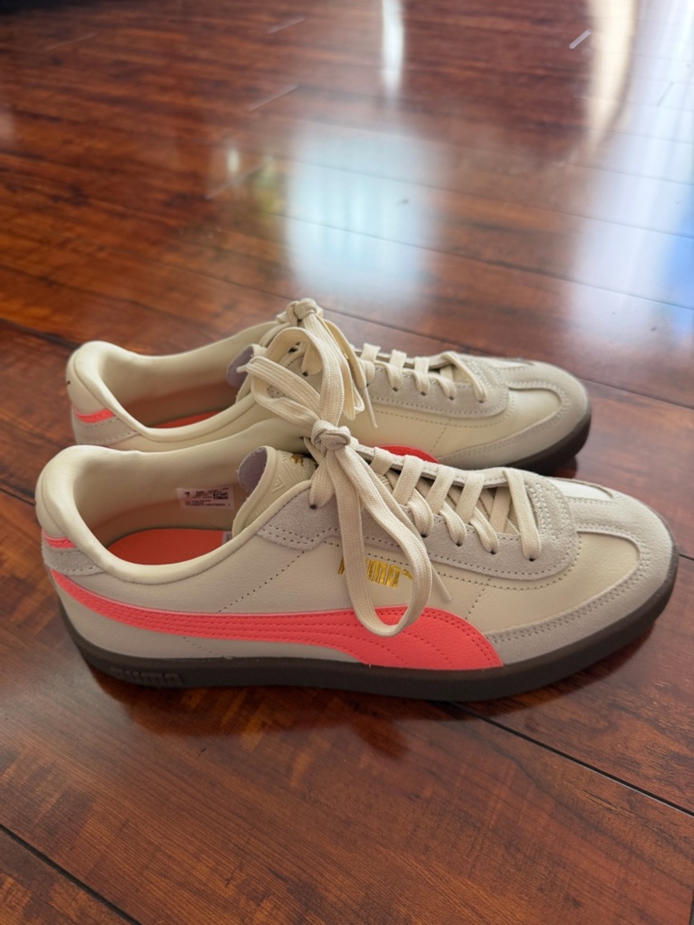 Puma Cream Sneaker with Pink Accent Stripe